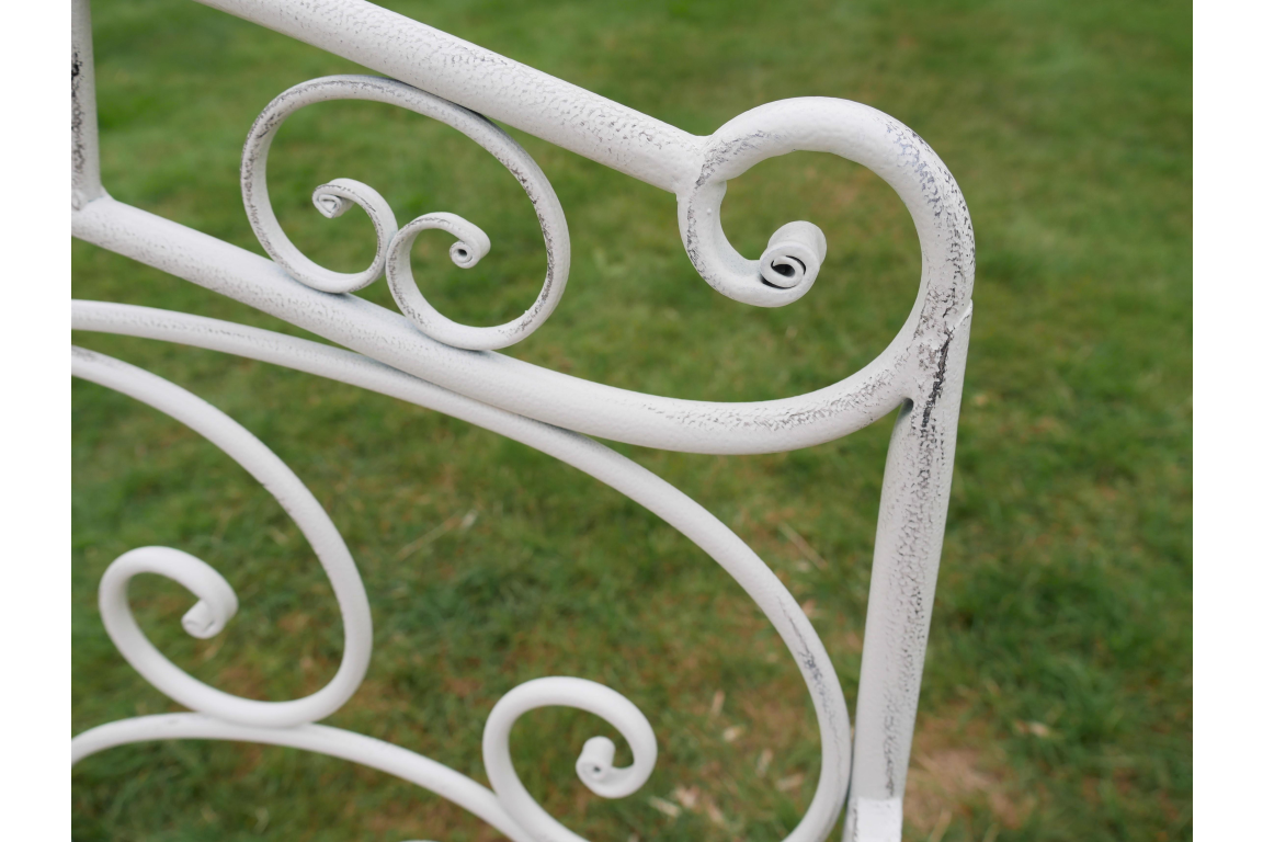 White Metal Outdoor Bench close up patina and ornate back