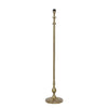 Raw antique bronze lamp Tall and slender floor lamp with curved details.